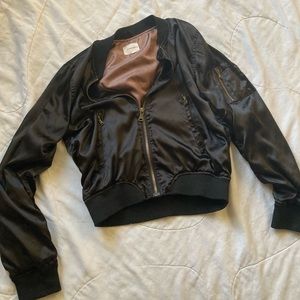 Black bomber with lots of pockets very comfortable size medium